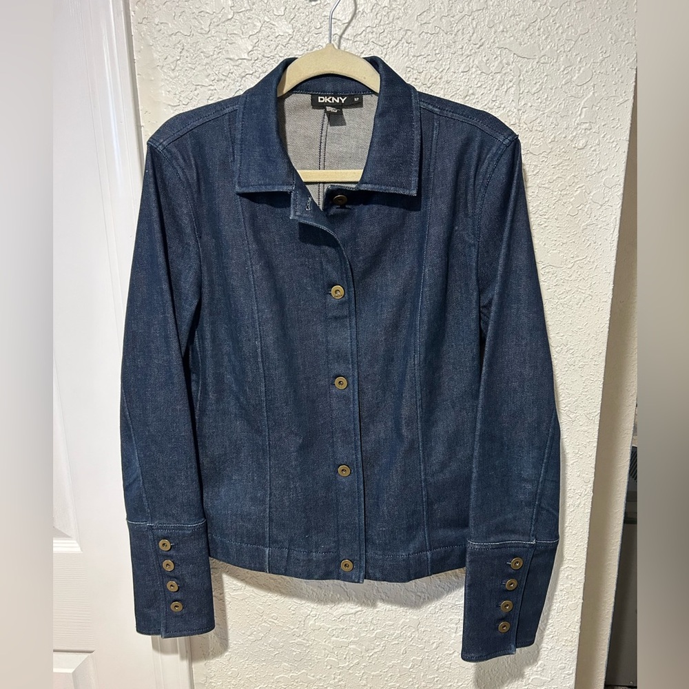 DKNY women’s size 12 blue denim jacket with pockets.